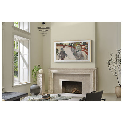 Samsung The Frame Pro 4K Vision AI Smart TV mounted above fireplace